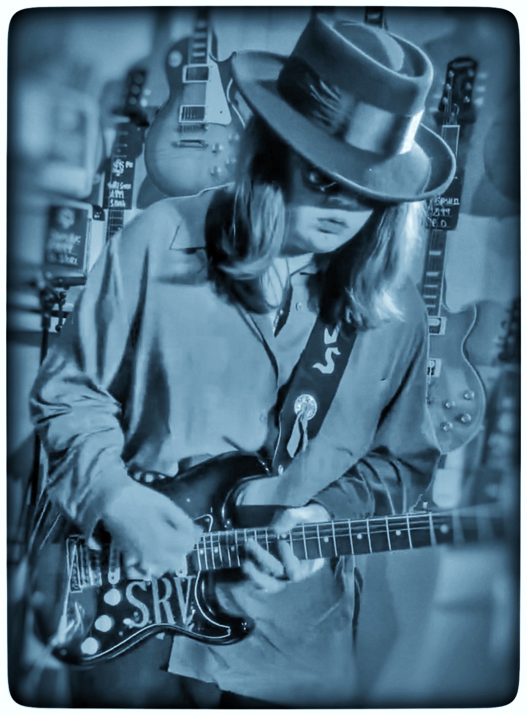 Rhys John Stygal playing guitar